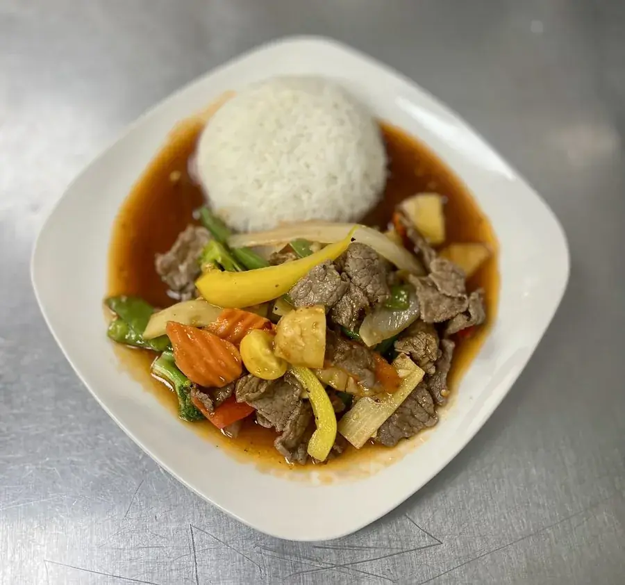 Thai beef stir-fry with peppers and pineapple over jasmine rice at Polly's Thai Food in Lawton, OK