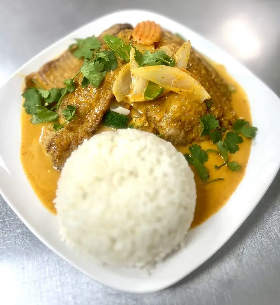Fried fish glazed in yellow curry sauce with jasmine rice at Polly's Thai Food in Lawton, OK